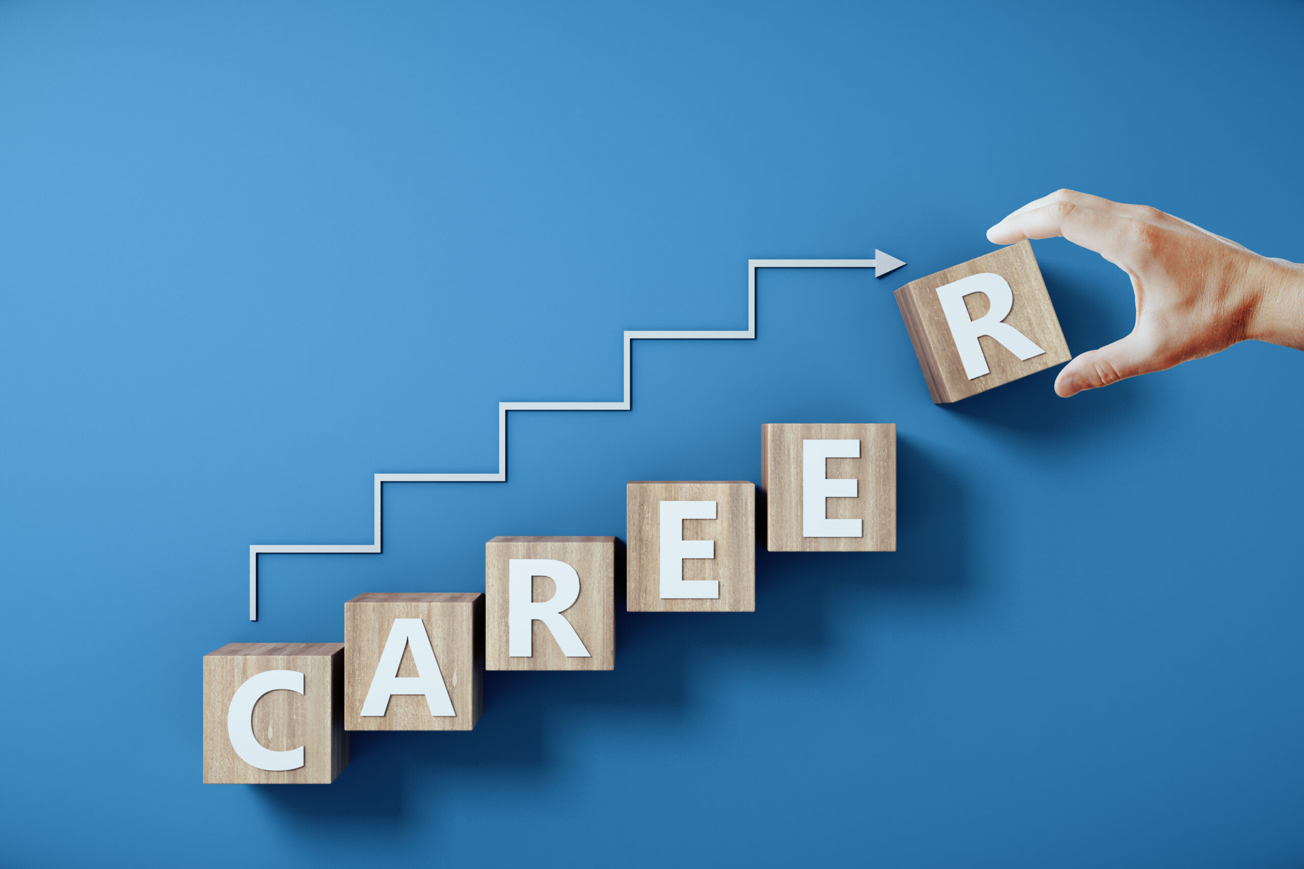 Career blocks rising step by step with an arrow upward, highlighting progress and career growth opportunities.